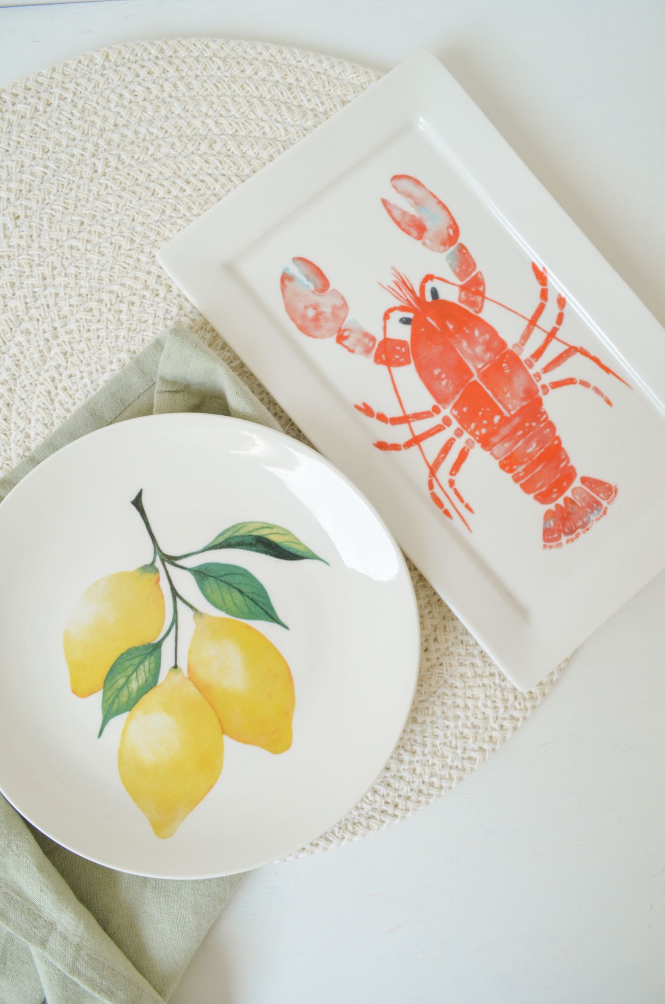 decoratieve wandbordjes met citroenen en kreeft